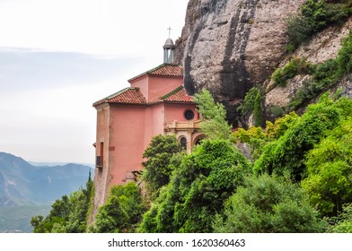 Small church in rock on Montserrat mountaun where Black Madonna statue was found, Barcelona, Spain