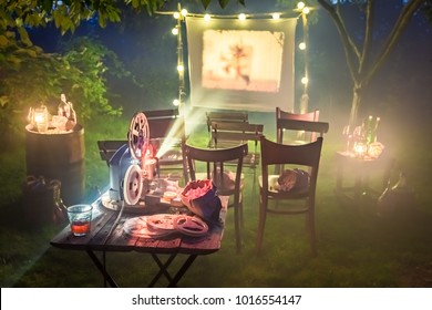 Small Cinema With Retro Projector In The Garden