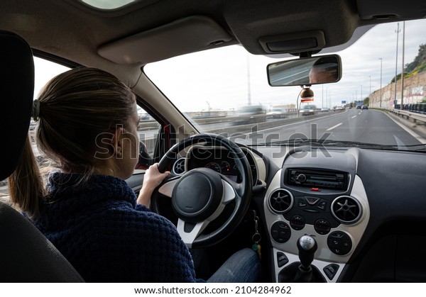 Small city utility\
car interior young driver