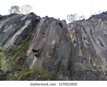 a small cliff seen from below