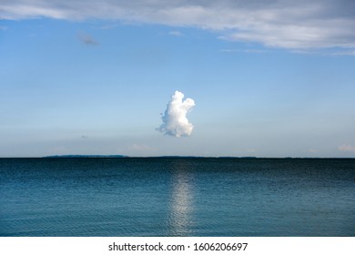 A Small Cloud Hangs Over Øresund At Faxe Ladeplads