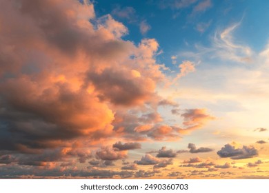 Small clouds in dramatic real sky at sunset texture background overlay. Dramatic blue, orange, and purple clouds. High resolution photograph perfect for sky replacement - Powered by Shutterstock