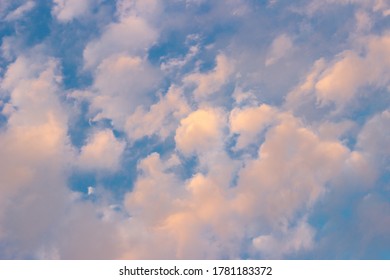 small clouds illuminated by the setting sun - Shutterstock ID 1781183372