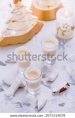 Small coconut liquor or eggnog for Christmas in white