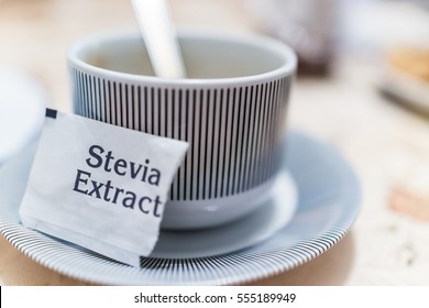 Small Coffee Cup On Plate With Stevia Extract Packet