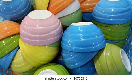 Small Colorful Ceramic Bowl Upside Down In Basket