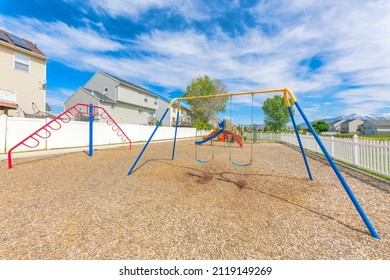 Small Community Playground Near The Fenced Residential Houses At Utah Valley