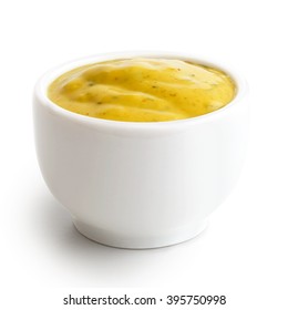 Small Condiment Bowl Of  Yellow Curry Sauce. Isolated On White In Perspective.