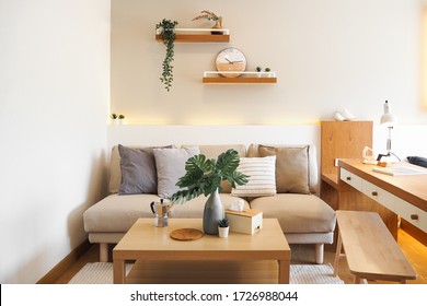 Small Condominium Interior Design Minimal japan design white and wood bedroom and sofa area - Shutterstock ID 1726988044