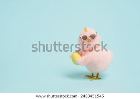 Similar – Image, Stock Photo A yellow Easter egg with bunny ears from a napkin on a plate. Top view.