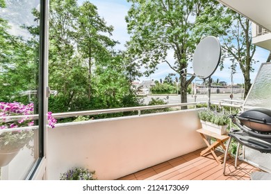 Small Cozy Apartment Balcony With Two Chairs