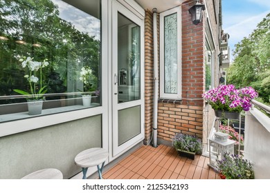 Small Cozy Apartment Balcony With Two Chairs