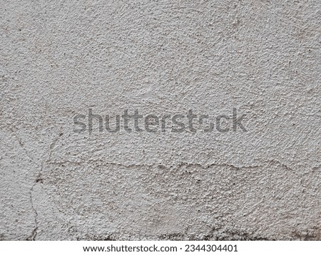 small crack on the white wall. old white congrete wall texture
