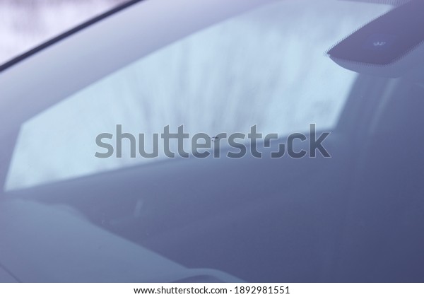 A small crack in the\
windshield