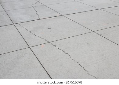 Small Cracks On Concrete Sidewalk