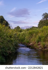 Small Creek In Grass Filed 