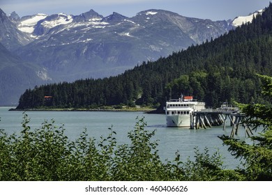 Small Cruise Ship Docked In Haines, Alaska, On A Summer Afternoon