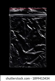 Small Crumpled Plastic Zip Bag Ziplock Lock Zipper Isolated On Black. Grunge Overlay Texture.