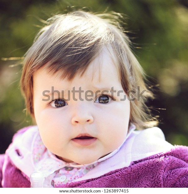 Small Cute Baby Girl Pretty Face Stock Photo Edit Now 1263897415