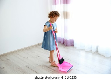 Small Cute Girl Cleaning Room