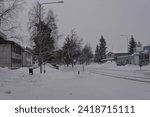 A small, cute winter town is Varkaus located in the province of North Savonia, Finland. Houses, roads, buildings, structures, trees, forests, fir trees, spruces covered with white snow.