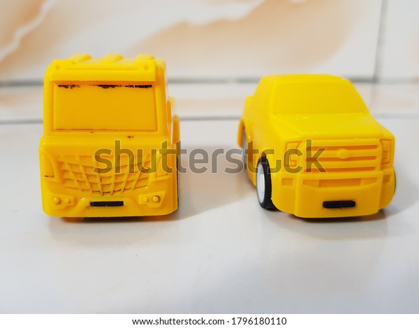 small cute yellow cars\
toy