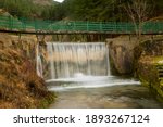 Small dam with waterfall in Park