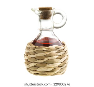 Small Decanter With Red Wine Vinegar Isolated On The White