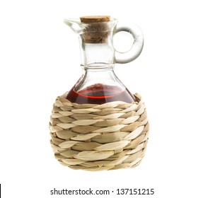 Small Decanter With Red Wine Vinegar Isolated On The White