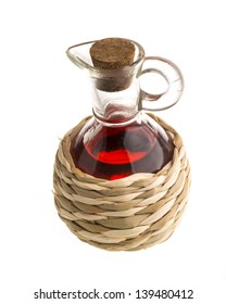 Small Decanter With Red Wine Vinegar Isolated On The White