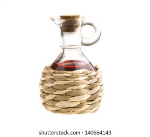 Small Decanter With Red Wine Vinegar Isolated On The White