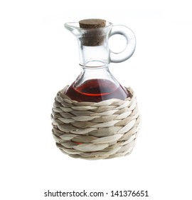 Small Decanter With Red Wine Vinegar Isolated On The White