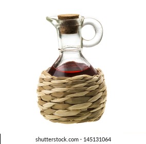 Small Decanter With Red Wine Vinegar Isolated On The White