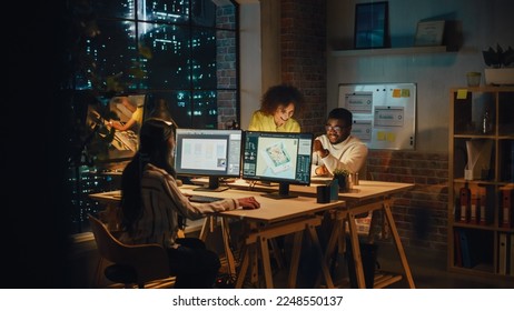 Small Diverse Multiethnic Group Collaborate on a Project and Work Together in an Office at Night. Team Leader Talking with a Professional, Laughing, Discussing Changes to a Software Design. - Powered by Shutterstock