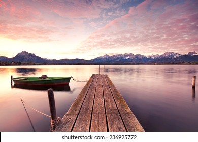 Small Dock And Boat At The Lake, Sunrise In Autumn