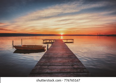 Small Dock and Boat at the lake, sunset shot
