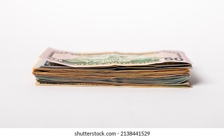Small dollar stack. American banknotes heap, side view. High quality photo