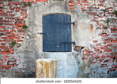 Small door in the side of a building.