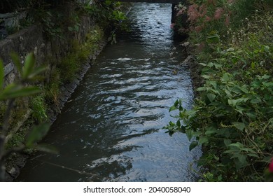 Small Drain Ditch With Water Flowing Through