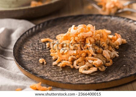 small dried shrimp on wooden table