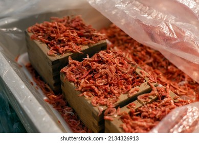 Small Dried Shrimp In A Wooden Masu Measuring Cube At An Asian Wet Market. 