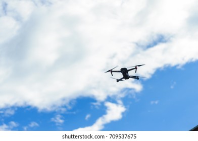 Small Drone In The Clouds