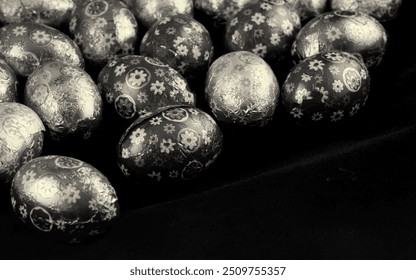 Small Easter Eggs against a black background. - Powered by Shutterstock