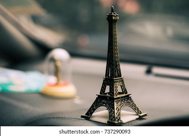 Small Eiffel tower toy background.
