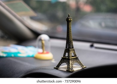 Small Eiffel tower toy background.