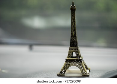 Small Eiffel tower toy background.