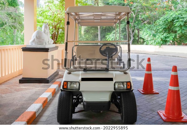 A small electric carts for transportation to\
customers within the golf\
resort