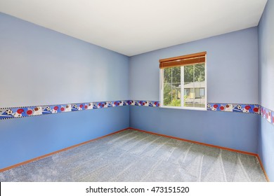 Small Empty Colorful Boy's Room With Carpet Floor And A Window. Northwest, USA