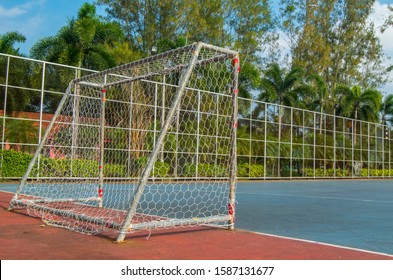 Small Empty Soccer Field With Goal Post And Beautiful Nature.