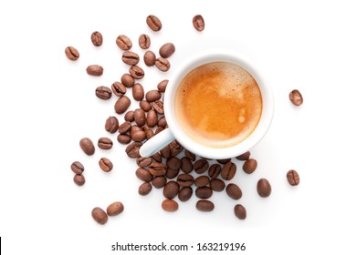 Small espresso cup with coffee beans isolated on white background
